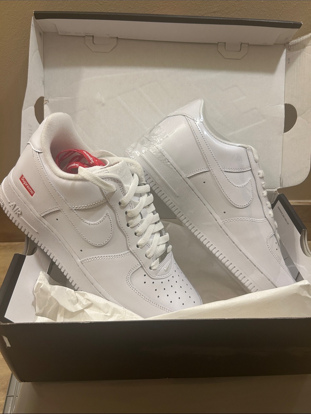 Nike Supreme AF1 White Low-Top Sneakers with Red Heel Tab